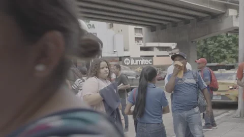 People waiting for a bus at a bus stop in Panama Stock-Footage 343747231
