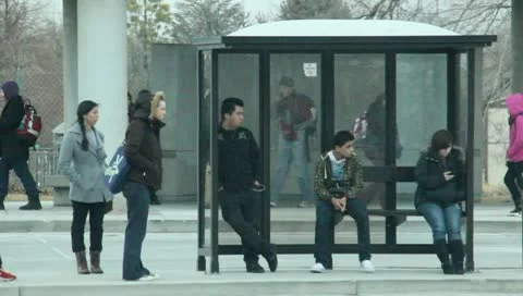 People waiting at the bus stop 8 Video stock 10720372