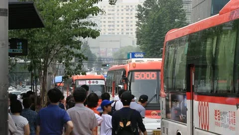 People waiting at bus stop Video stock 11133206