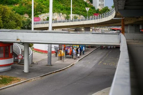 People waiting for buses beneath Most SNP bridge Stock Photos