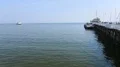 People waiting for ferry vessel on pier, passenger transportation, sequence HD Footage