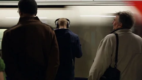 People waiting for the London underground Stock Footage