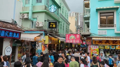 People waiting in a long queue for foods in opposite direction Stock Footage 271629248