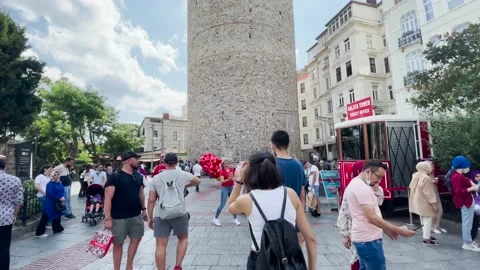 People waiting in a queue to buy tickets for Galata Tower in Istanbul Video stock 162978788