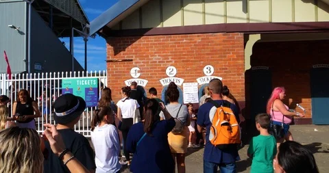 People waiting in queue for tickets lining up to buy Video stock 104256330