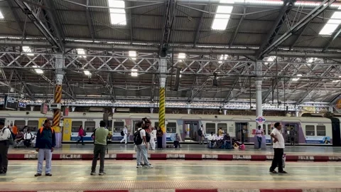 People Waiting on Railway Platform for Local Train Arrival India 4K Stock Footage 346197522