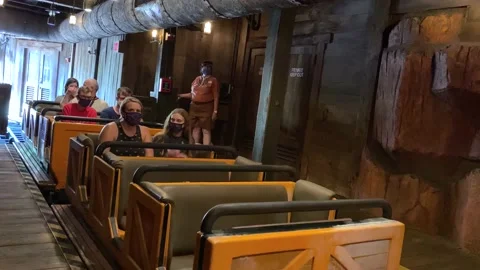 People waiting for a rollercoaster to take off Stock Footage 141226408