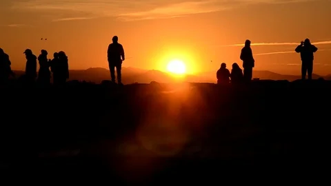 People waiting for the sundown Stock Footage 74129279