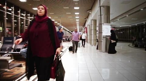 People waiting for their flight inside an Arab Airport (Bahrain) 01 Stock Footage 68987810