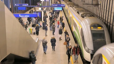 People waiting, train entering the platform in Warsaw Main Station Stock Footage 101948750