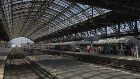 People waiting for the train on the platform at Cologne Central Station, Germany Stock Footage 160760860