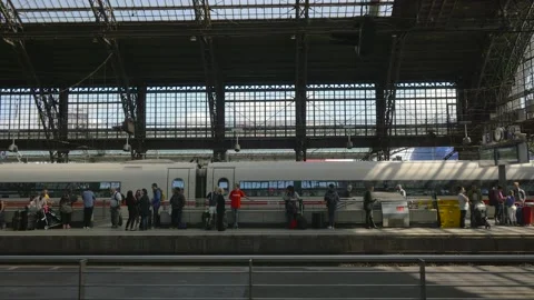 People waiting for the train on the platform at Cologne Central Station, Germany Stock Footage 160760913