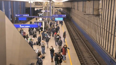 People waiting for train on the platform in Warsaw Main Station Stock Footage 101736562