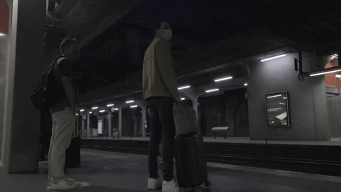 People waiting for a train in the train station in rouen Stock Footage 139172946