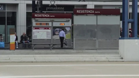 People waiting at tramway stop 2 Stock Footage 75382413