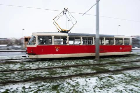 People waiting walking the platform while waiting descending for tram on a sn Stock Photos