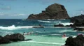 People waiting for the wave in natural ocean bath HD Footage