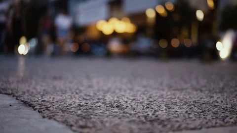 People waking at night, focus in foreground, slow motion Stock Footage 77752100