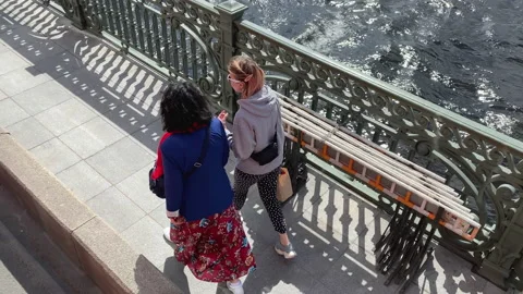 People walk across the Trinity Bridge Stock-Footage 155427285