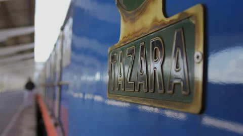 People Walk Along Side Of A Train In A Station.DaresSalaam Tanzania Stock Footage 131451526