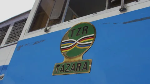 People Walk Along Side Of A Train In A Station.DaresSalaam Tanzania Stock Footage 131476197