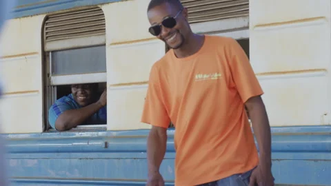People Walk Along Side Of A Train In A Station.DaresSalaam Tanzania 動画素材 131537747
