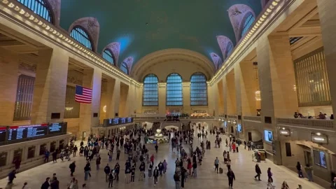 People walk around the Main Concourse at Grand Central Terminal. New York City Stock Footage 337837916