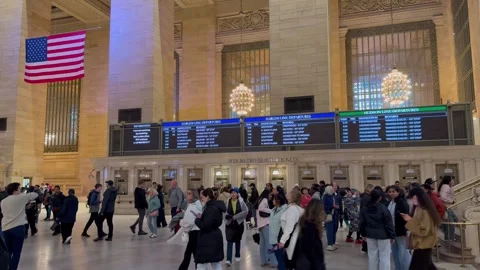 People walk around the Main Concourse at Grand Central Terminal. New York City Vídeo Stock 337837923