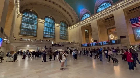 People walk around the Main Concourse at Grand Central Terminal. New York City Stock Footage 337837955