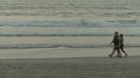 People walk on beach Stock Footage 12468170