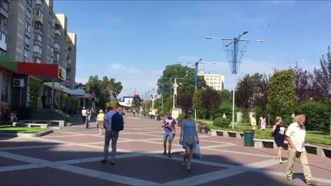 People walk in a big square in eastern europe Stock-Footage 90600571