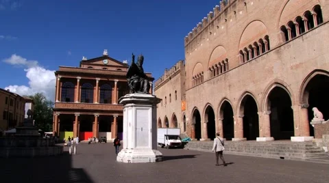 People walk by the Cavour square (Piazza Cavour) in Rimini, Italy. Video stock 59963644
