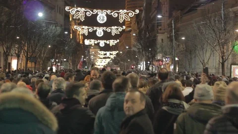 People walk during a protest in Belgrade. Stock Footage 102372456