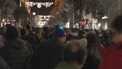 People walk during a protest in Belgrade. Stock Footage 102372526