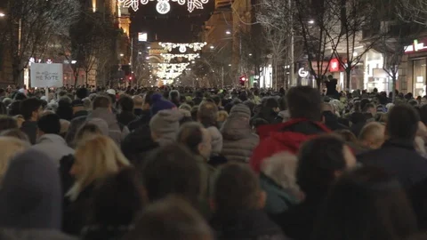 People walk during a protest in Belgrade. Stock Footage 102372663