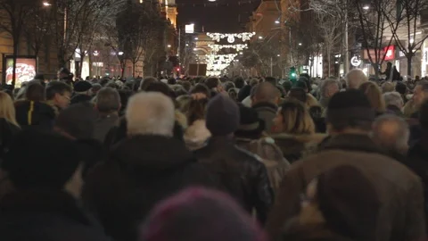 People walk during a protest in Belgrade. Stock Footage 102372812