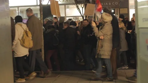 People walk during a protest in Belgrade. Stock Footage 102373398