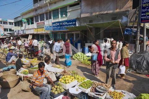 People Walk By The Local Market In Bandarban, Bangladesh.