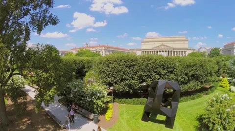 People walk  in National Gallery of Art-Sculpture Garden Stock Footage