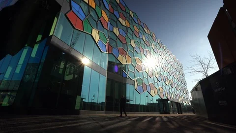 People walk past One Smithfield, the Stoke City Council office building Stock Footage 103479341