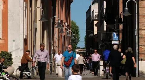 People walk by the pedestrian street in Ravenna, Italy. Stock Footage 59796131
