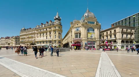People walk on the Place de la Comédie square in Montpellier timelapse Stock Footage 59084792