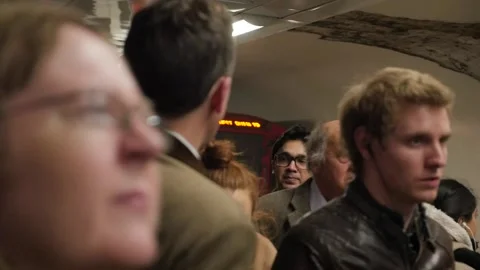 People Walk On The Platform While Train Arrives in London Tube Slow-motion HD Stock Footage 131174171