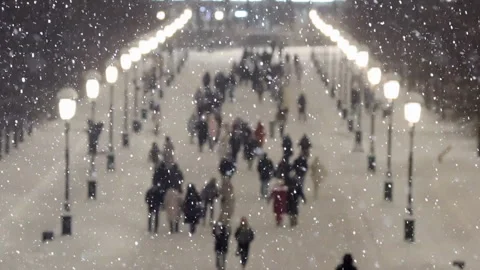 People walk snowfall Stock Footage 169013001