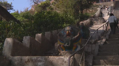 People walk on stairs in Monkey Temple Stock Footage 59796177