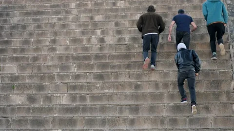 People walk up the steps Stock Footage 237200138