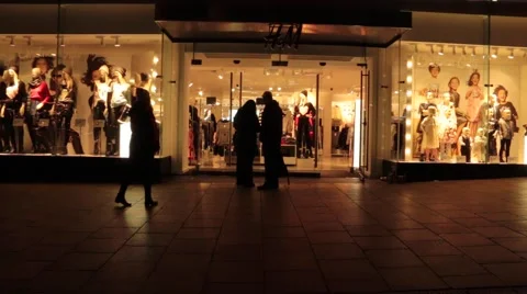 People Walk By Street With Shops Stock Footage 44237331