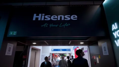 People walk through hallways exploring exhibits at a trade show convention Stock Footage 318065431