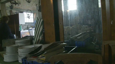 People walk through old barn with items for sale Stock Footage 37628955