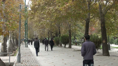 People walk through park in Tehran, Iran Video stock 33941803